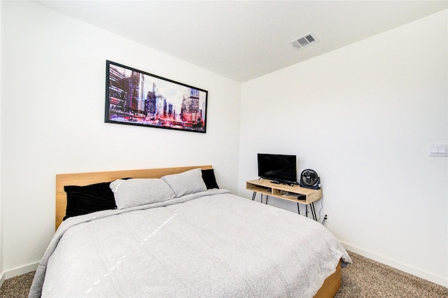 bedroom featuring carpet, visible vents, and baseboards