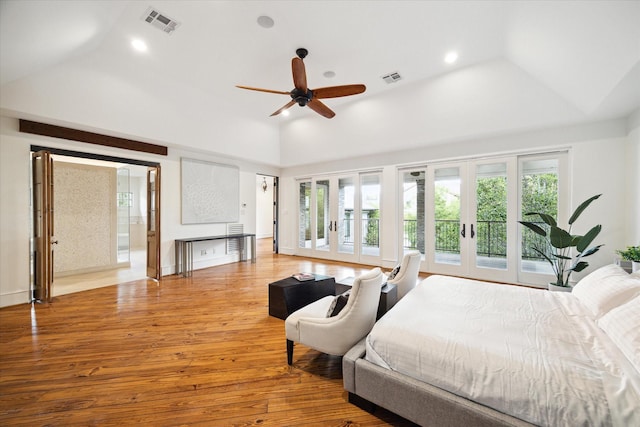 bedroom featuring access to outside, visible vents, wood finished floors, and french doors