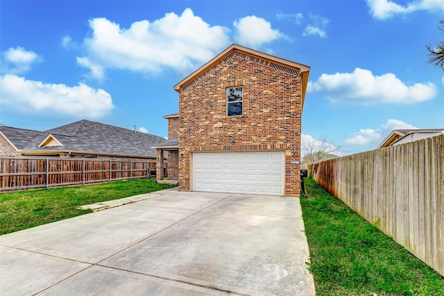 view of property exterior featuring a garage, a yard, brick siding, and driveway