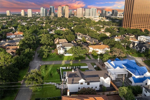 aerial view at dusk with a city view