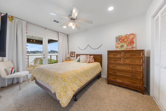 53 La Costa Dr, Montgomery, TX 77356 - bedroom with access to exterior, carpet floors, french doors, visible vents, and a ceiling fan
