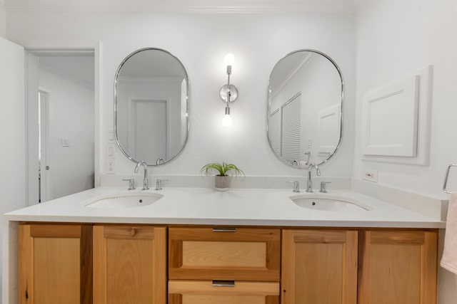 53 La Costa Dr, Montgomery, TX 77356 - bathroom with double vanity, crown molding, and a sink