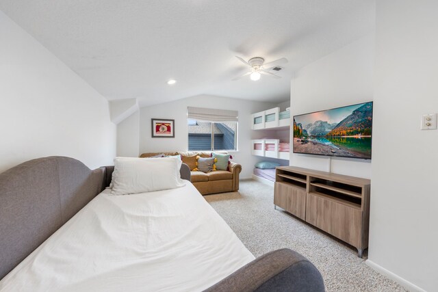 53 La Costa Dr, Montgomery, TX 77356 - bedroom with baseboards, a ceiling fan, light colored carpet, vaulted ceiling, and recessed lighting