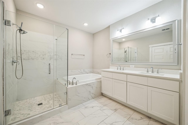 full bathroom featuring a bath, a stall shower, a sink, and visible vents