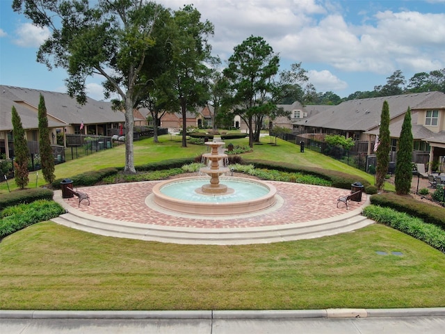 15331 Westland Gate Dr, Conroe, TX 77384 - view of property's community with a residential view, fence, and a lawn