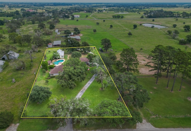 birds eye view of property featuring a rural view