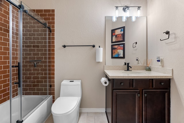 bathroom with enclosed tub / shower combo, toilet, vanity, baseboards, and tile patterned floors