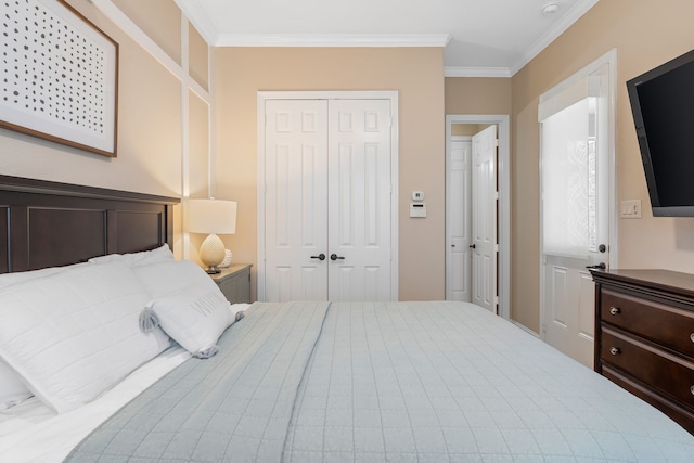 bedroom featuring ornamental molding and a closet