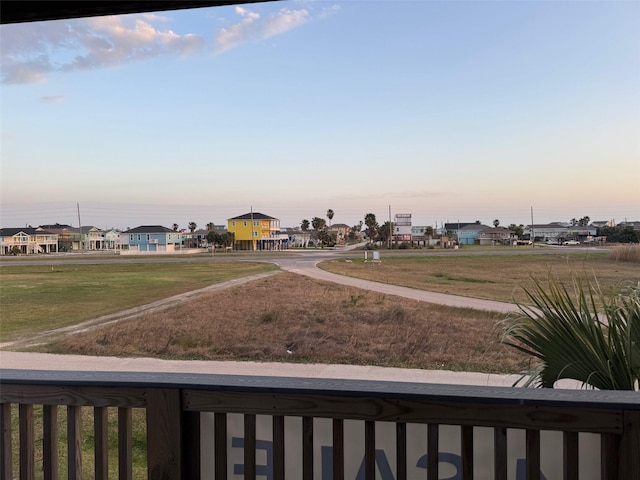 view of yard at dusk