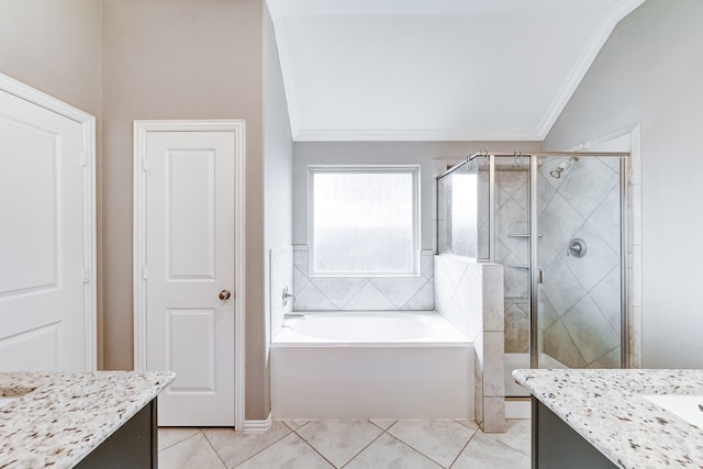 bathroom with lofted ceiling, a garden tub, tile patterned flooring, vanity, and a shower stall