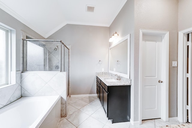 full bath with a stall shower, plenty of natural light, and crown molding