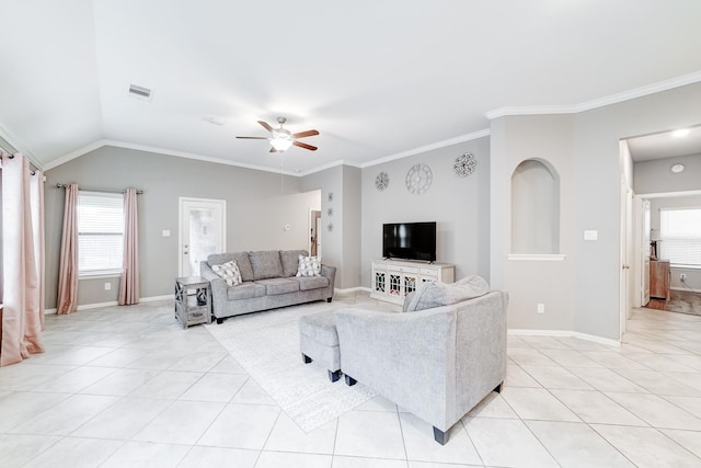 living area with light tile patterned floors, visible vents, lofted ceiling, ceiling fan, and ornamental molding