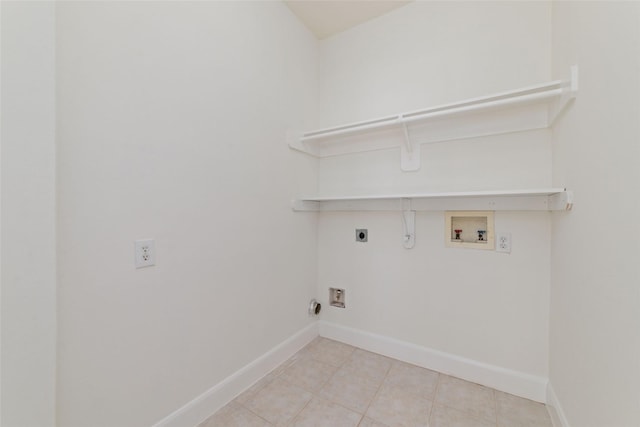 clothes washing area featuring washer hookup, laundry area, hookup for an electric dryer, and baseboards