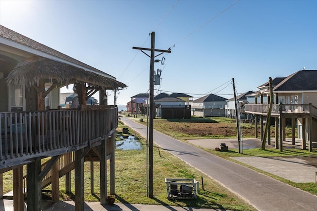 exterior space featuring fence and a residential view