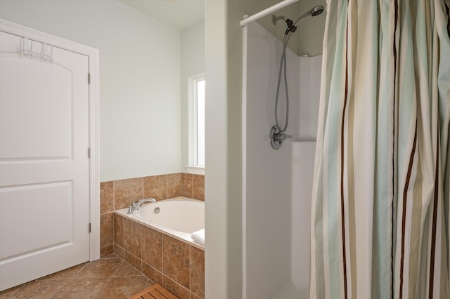 bathroom featuring a bath and a shower with shower curtain