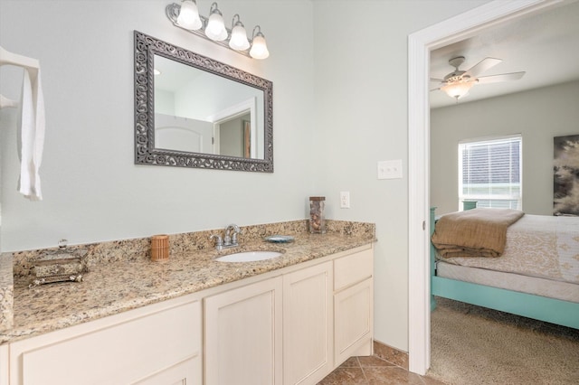 bathroom featuring vanity and a ceiling fan