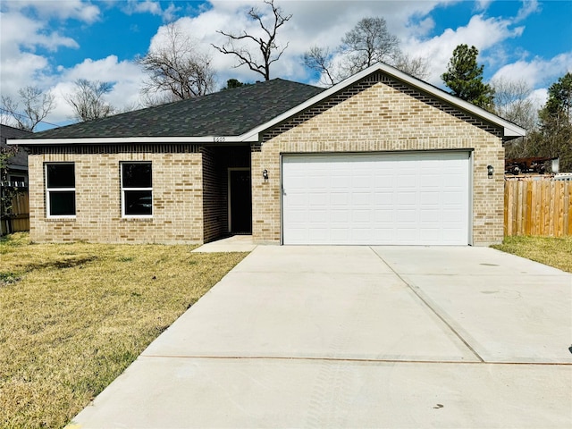 ranch-style house with a garage, brick siding, fence, driveway, and a front yard