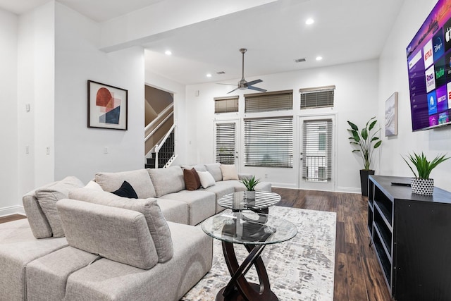 living room featuring dark wood-style flooring, recessed lighting, visible vents, a ceiling fan, and baseboards