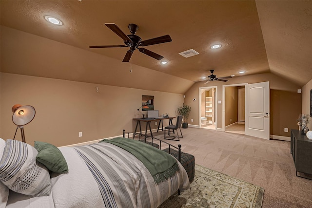 bedroom featuring lofted ceiling, light carpet, visible vents, and baseboards