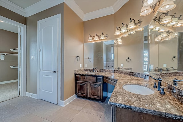 bathroom with crown molding, double vanity, a sink, and tile patterned floors