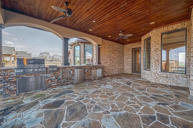 view of patio featuring grilling area, a ceiling fan, and area for grilling
