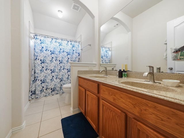 full bathroom with visible vents, a sink, toilet, and tile patterned floors