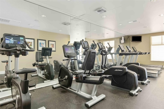 exercise room featuring visible vents