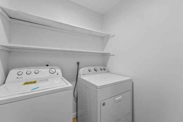 laundry area featuring laundry area and washing machine and clothes dryer