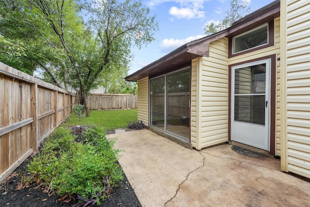 exterior space with a fenced backyard