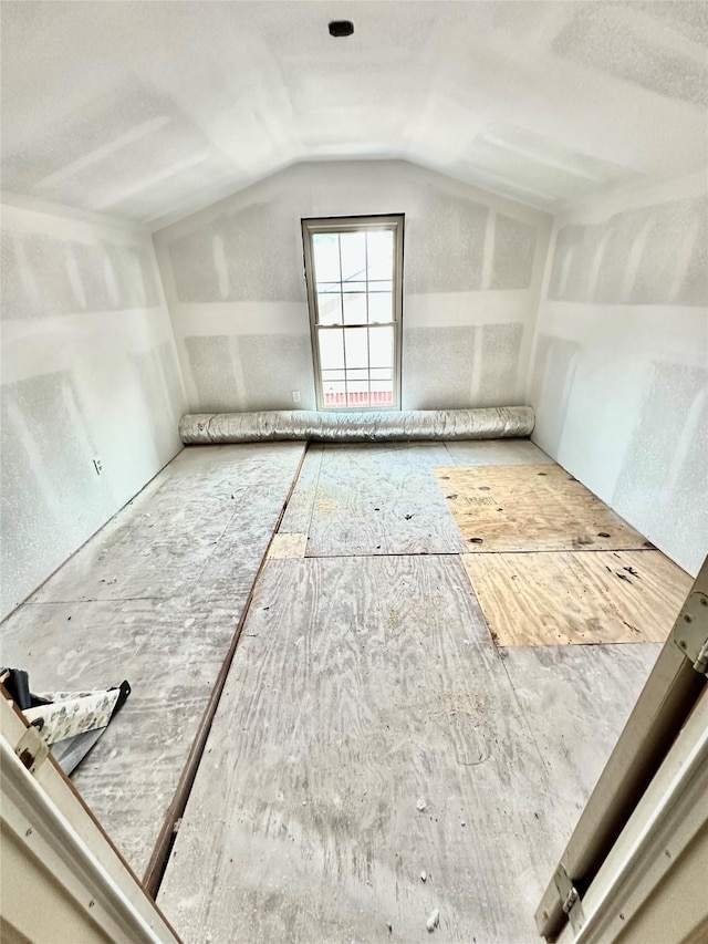 bonus room featuring lofted ceiling