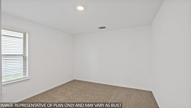 empty room with carpet floors, visible vents, and baseboards