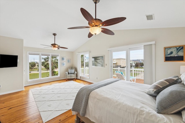 bedroom featuring access to exterior, light wood-style flooring, multiple windows, and visible vents