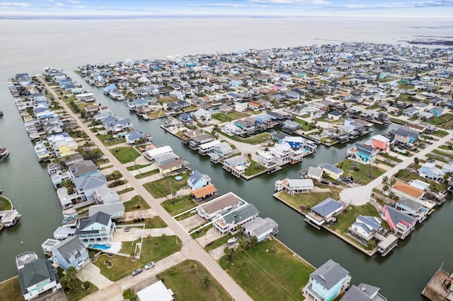 4027 Nueces Dr, Galveston, TX 77554 - birds eye view of property featuring a water view and a residential view