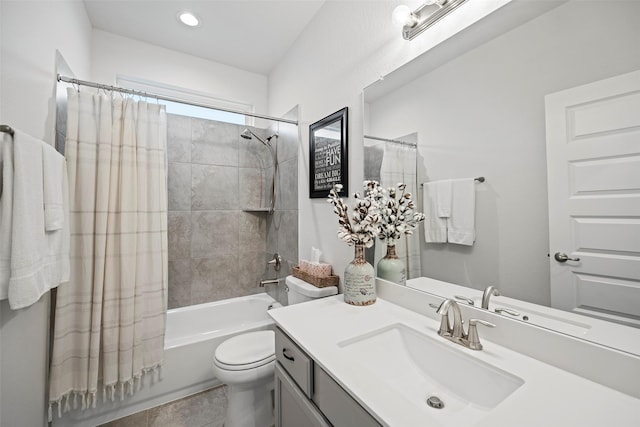 full bath featuring toilet, shower / bathtub combination with curtain, and vanity