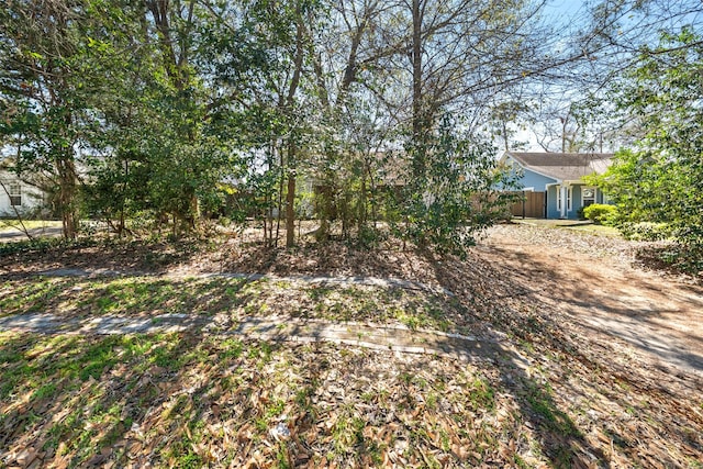 view of yard with fence