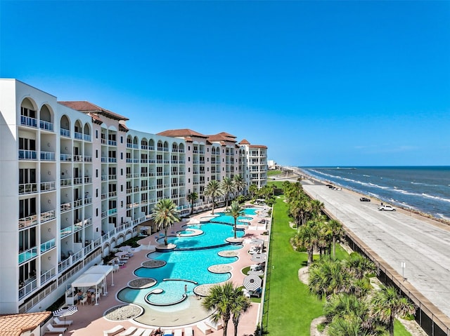 birds eye view of property featuring a water view