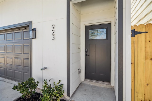 property entrance featuring a garage