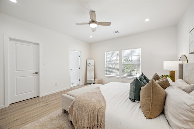 bedroom featuring recessed lighting, visible vents, light wood-style floors, a ceiling fan, and baseboards