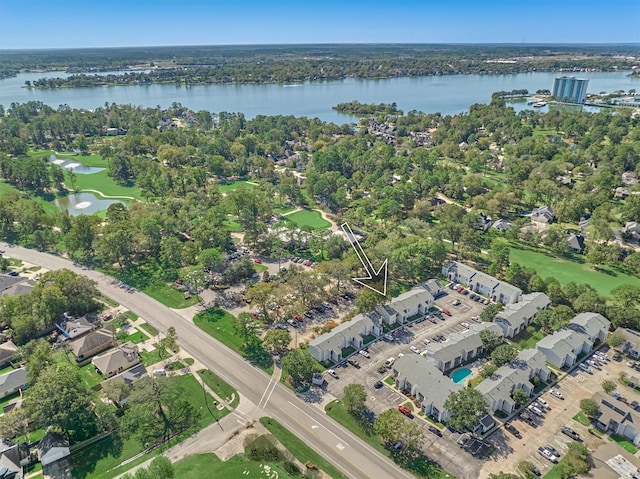 birds eye view of property featuring a water view