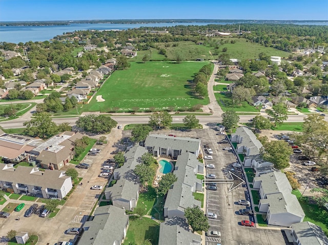 aerial view featuring a water view and a residential view