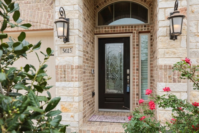 5615 Alexan Crest Dr, Fulshear, TX 77441 - view of exterior entry featuring brick siding