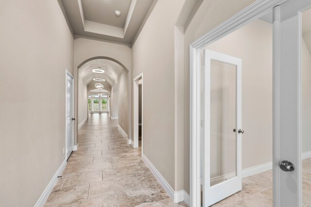 5615 Alexan Crest Dr, Fulshear, TX 77441 - corridor featuring arched walkways and baseboards
