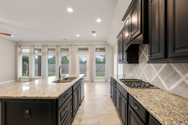5615 Alexan Crest Dr, Fulshear, TX 77441 - kitchen featuring a sink, stainless steel appliances, recessed lighting, decorative backsplash, and a center island with sink