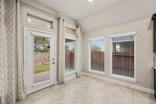5615 Alexan Crest Dr, Fulshear, TX 77441 - doorway to outside featuring lofted ceiling, baseboards, recessed lighting, and light tile patterned floors