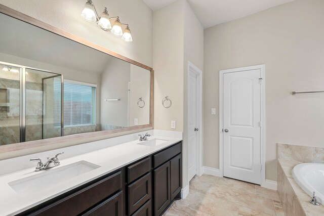 5615 Alexan Crest Dr, Fulshear, TX 77441 - full bath featuring a garden tub, double vanity, a shower stall, and baseboards