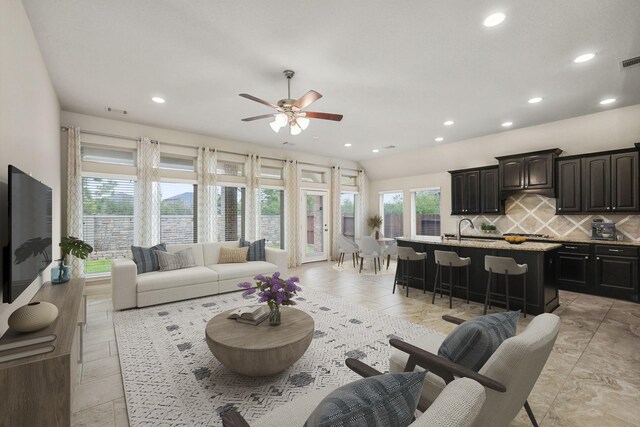 5615 Alexan Crest Dr, Fulshear, TX 77441 - living area featuring ceiling fan and recessed lighting