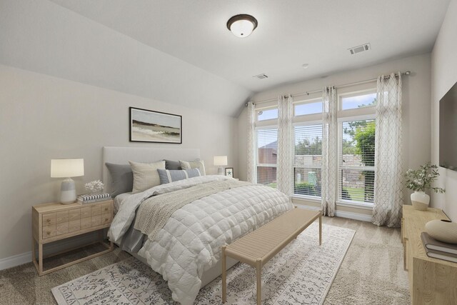 5615 Alexan Crest Dr, Fulshear, TX 77441 - bedroom with carpet floors, baseboards, and vaulted ceiling