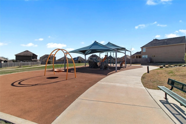 community jungle gym with fence