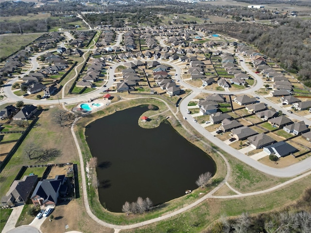 aerial view with a water view and a residential view