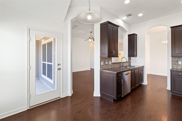 kitchen with a sink, dark brown cabinetry, dark wood-style floors, and dishwasher